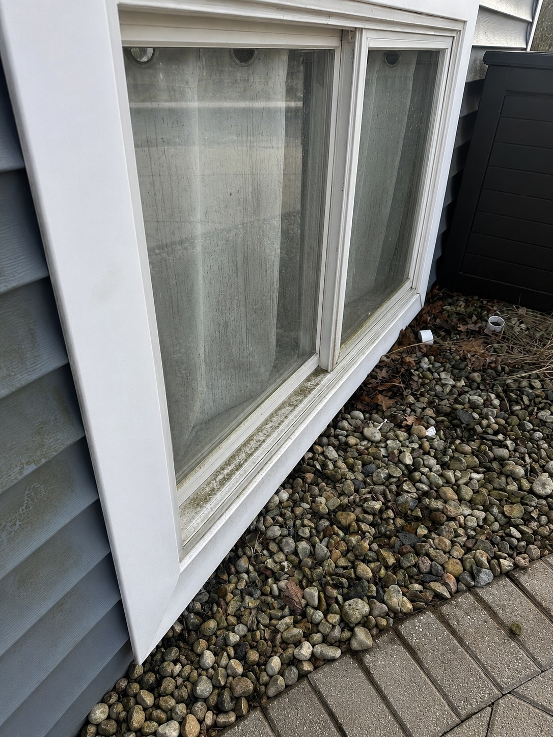 Lower bedroom window, before professional window cleaning